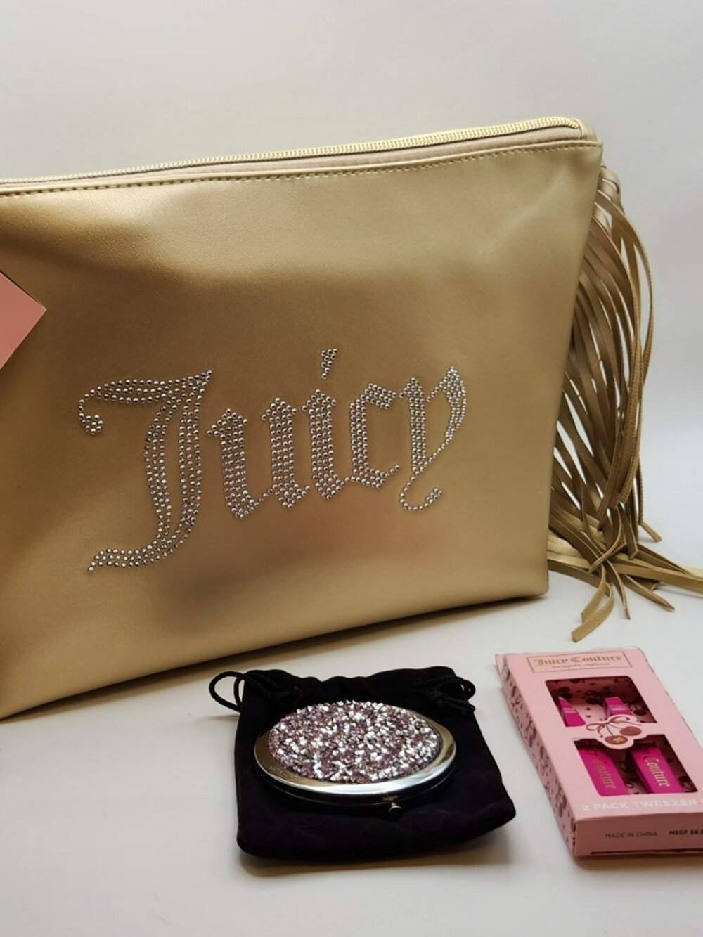 Juicy Couture travel cosmetic bag with tassels gold NWT includes extras !!!